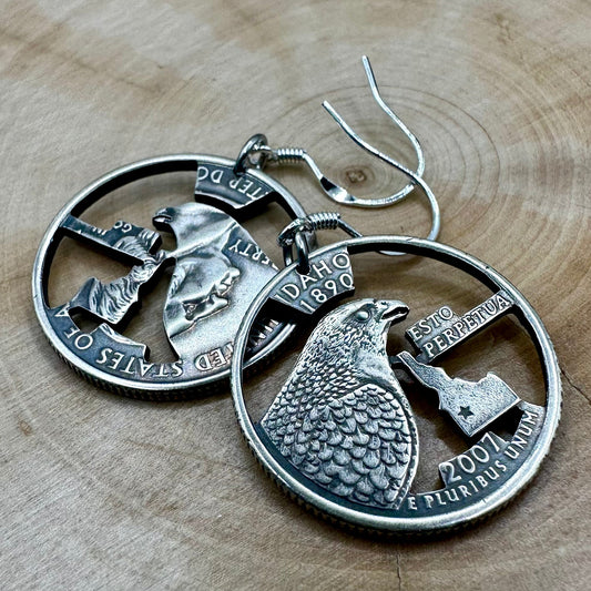 U.S. State Quarter Hand Cut Coin Earrings on a wood background. - Mountainstruck Coin Jewelry