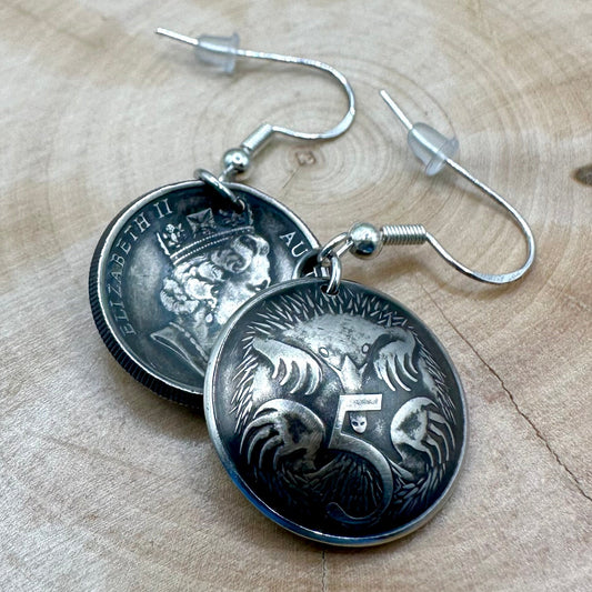 Australia Echidna 5 Cent Domed Coin Earrings on a light wood round. - Mountainstruck Coin Jewelry