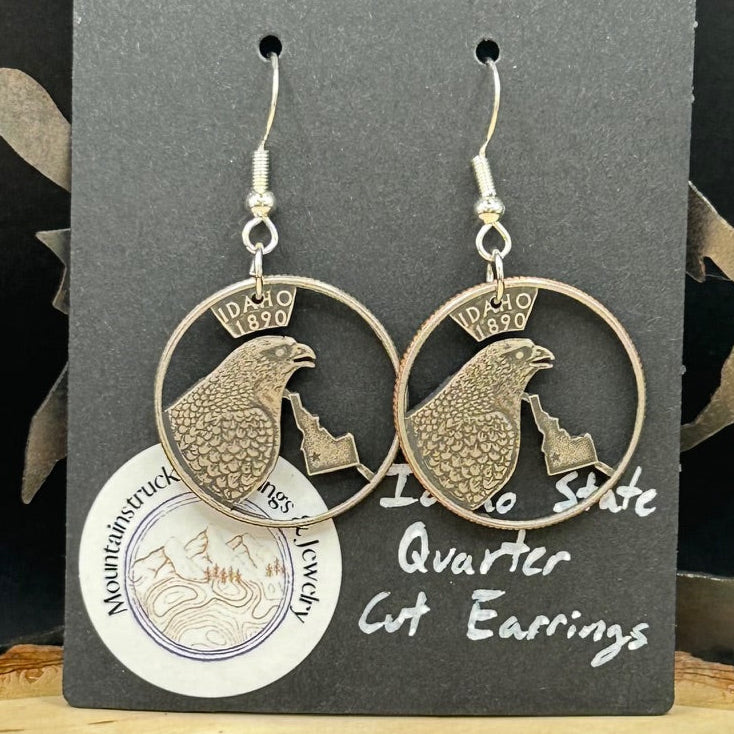 Idahome State Quarter Hand Cut Coin Earrings on a black earring backing. - Mountainstruck Coin Jewelry