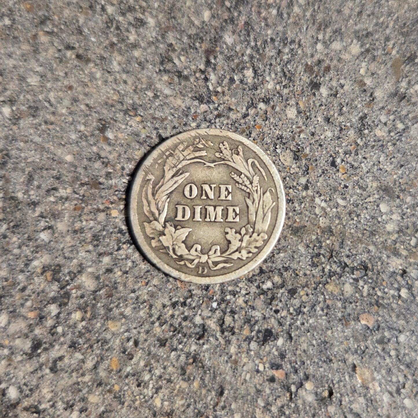 U.S Barber Dime Silver Coin back on a concrete background. - Mountainstruck Coin Jewelry