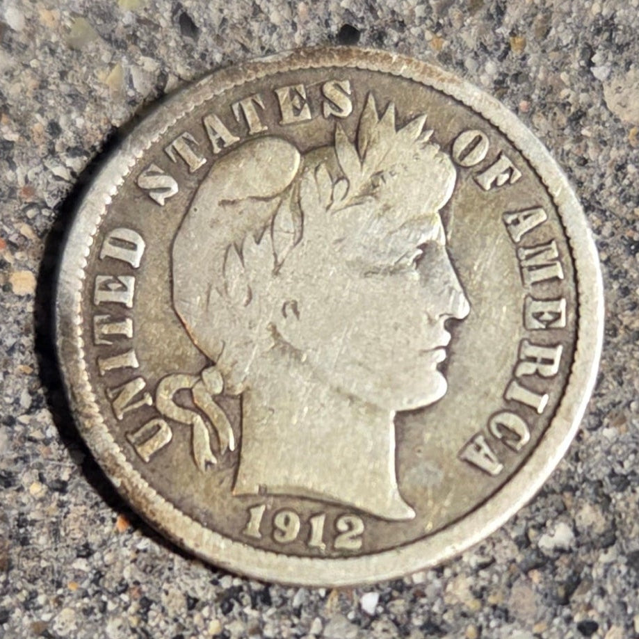 U.S Barber Dime Silver Coin front on a concrete background. - Mountainstruck Coin Jewelry