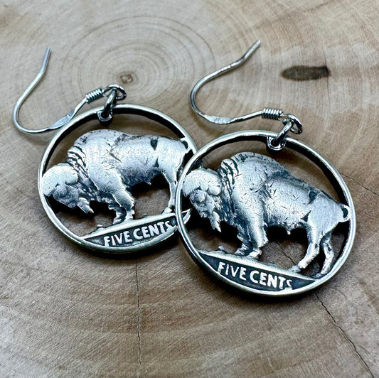 U.S. Buffalo Nickel Hand Cut Coin Earrings on a light wood round. - Mountainstruck Coin Jewelry