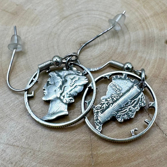 U.S. Mercury Dime Silver Hand Cut Coin Earrings on a light wood round. - Mountainstruck Coin Jewelry