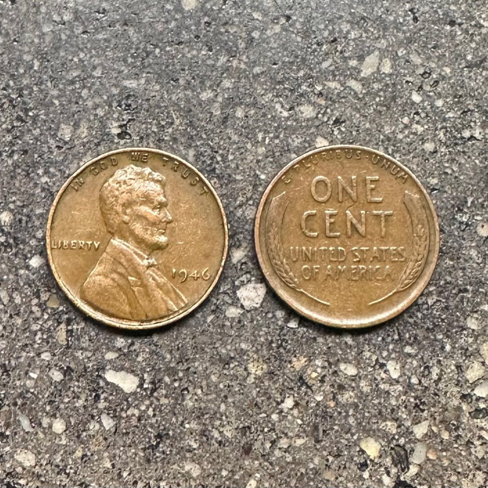 U.S. Wheat Penny coins on a concrete background. Frontside of coin on the left side of picture and back of coin on the right side. - Mountainstruck Coin Jewelry