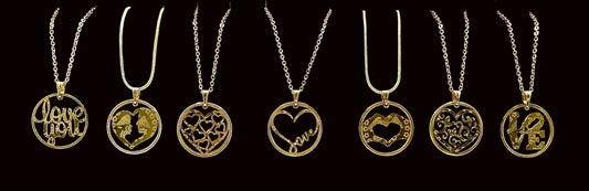 24k Gold Plated Heart Token Necklaces with various designs on a black background. - Mountainstruck Coin Jewelry