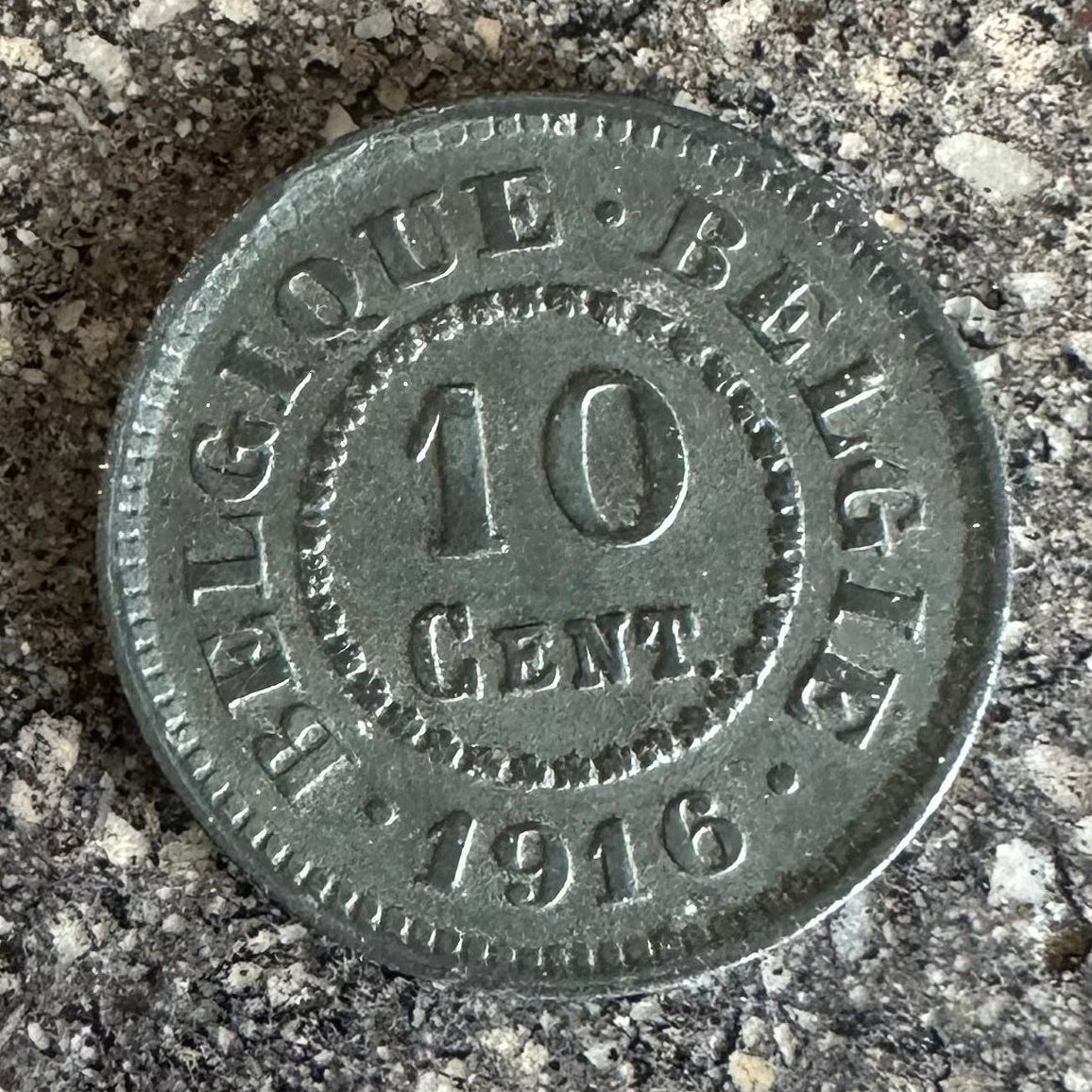 Belgium 10 Cents Lion back of coin on a concrete background - Mountainstruck Coin Jewelry