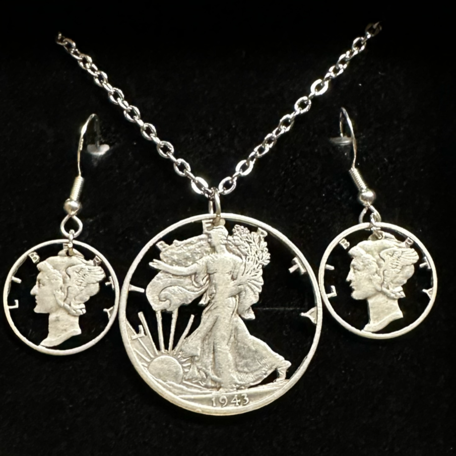 U.S. Lady Liberty Silver Hand Cut Coin Collection (stainless chain) in a brown kraft box on a black velvet background. - Mountainstruck Coin Jewelry