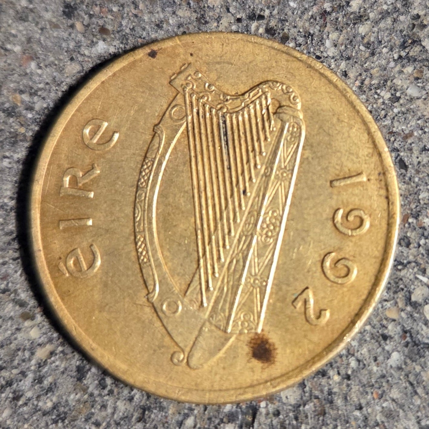 Ireland Horse 20 Pence Coin front on a concrete background. - Mountainstruck Coin Jewelry