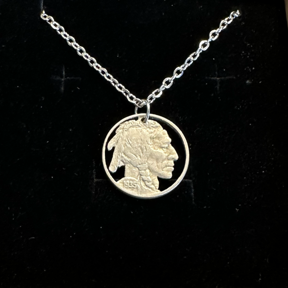 U.S. Buffalo Nickel Hand Cut Coin Necklace (Front) with a stainless chain in brown kraft box on black velvet background. - Mountainstruck Coin Jewelry