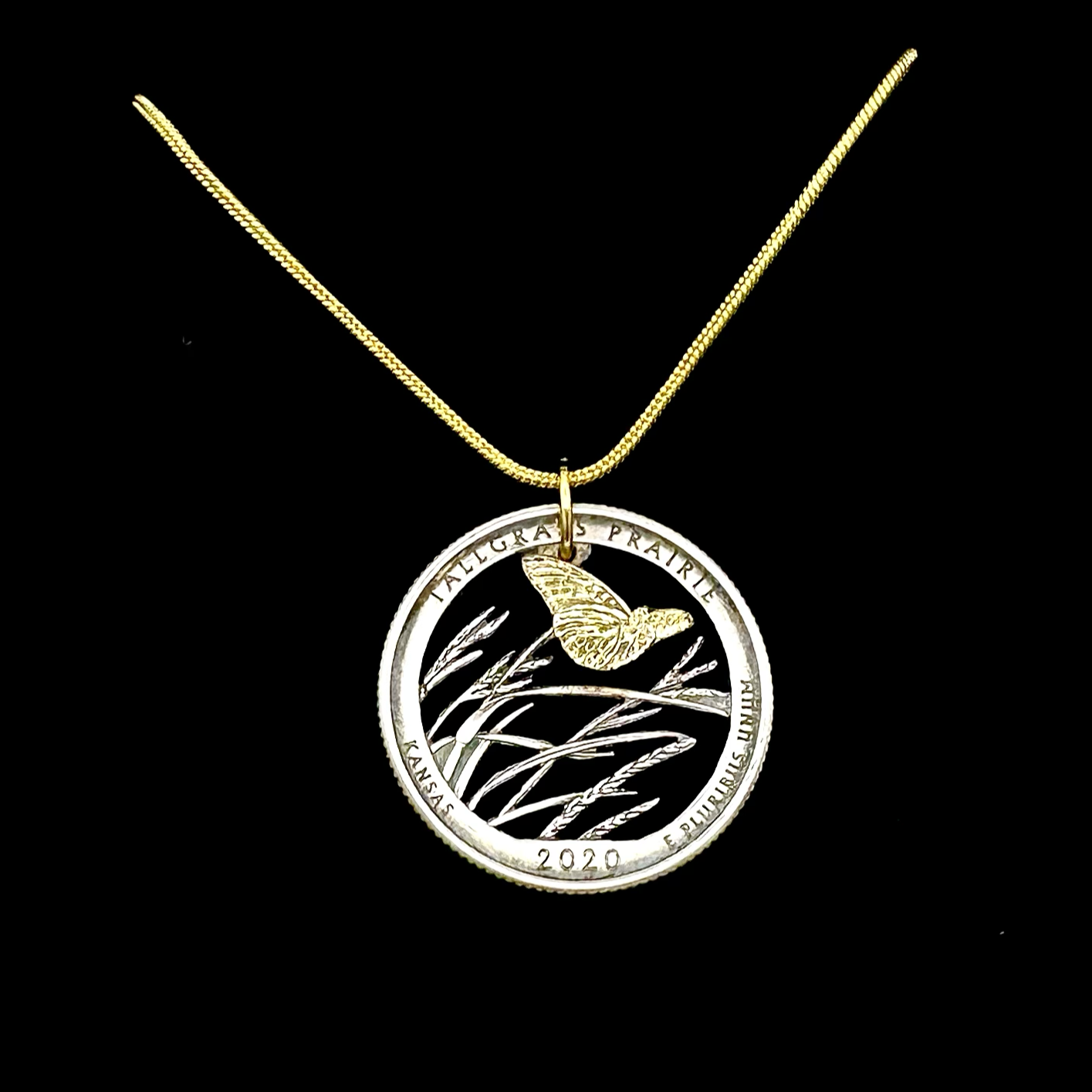 U.S. Butterfly Tallgrass Quarter Prairie Hand Cut Coin Necklace with gold plated butterfly on a black velvet background - Mountainstruck Coin Jewelry