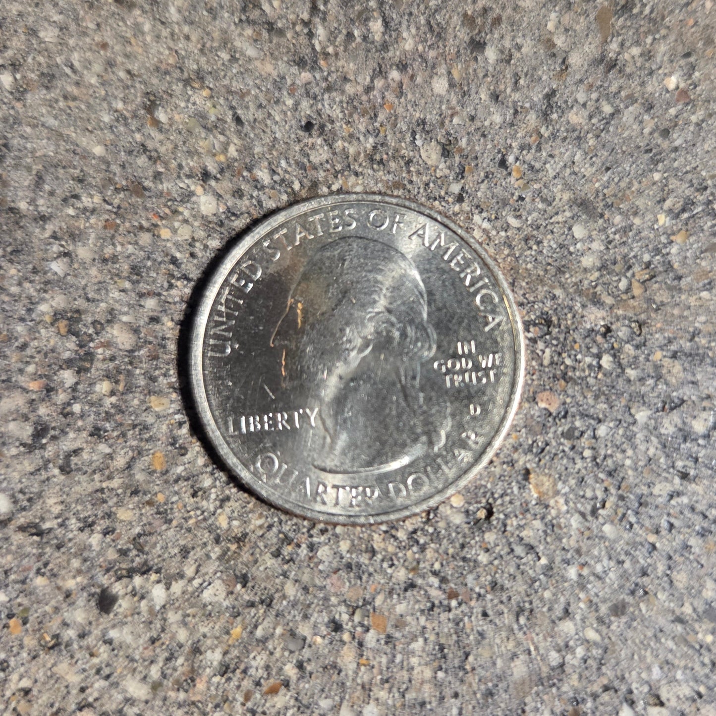 U.S. Butterfly Tallgrass Prairie Quarter Coin front on a concrete background - Mountainstruck Coin Jewelry