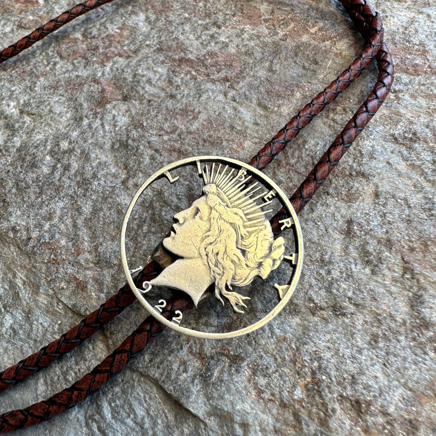 U.S. Peace Dollar Hand Cut Silver Coin Bolo Tie with a dark brown leather cord - Mountainstruck Coin Jewelry