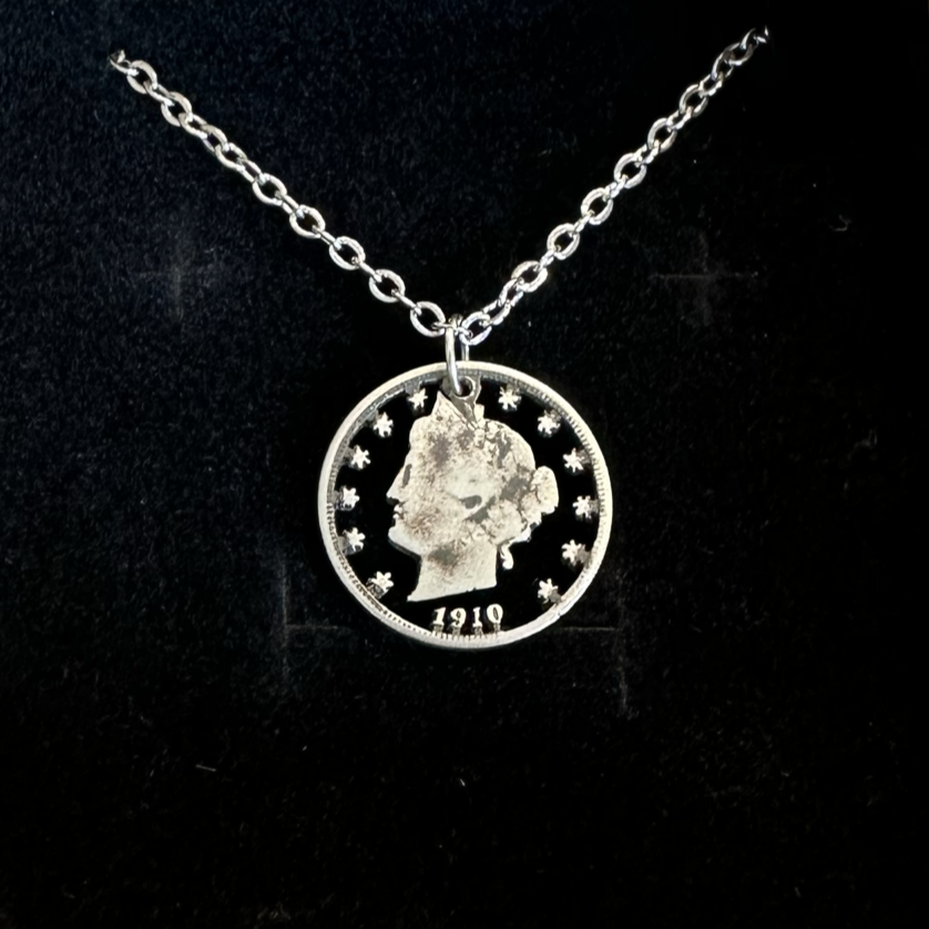 U.S. "V" Nickel Hand Cut Coin Necklace with a stainless chain with a black velvet background. - Mountainstruck Coin Jewelry