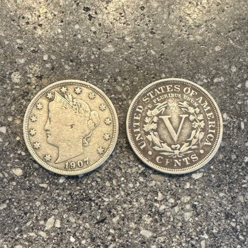 U.S. "V" Nickel Coin on a concrete background. Front side of the coin on the left side of the picture and back of coin on the right. - Mountainstruck Coin Jewelry
