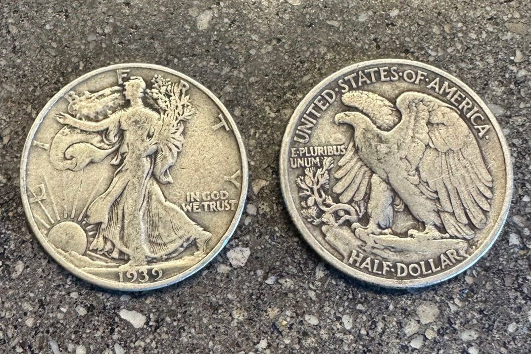 U.S. Walking Liberty Silver Coin on a concrete background. Front face of coin on the left side of the picture and back side on the right side. - Mountainstruck Coin Jewelry