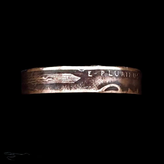 U.S. Wheat Penny Coin Ring in a brown kraft box on a black velvet background. - Mountainstruck Coin Jewelry