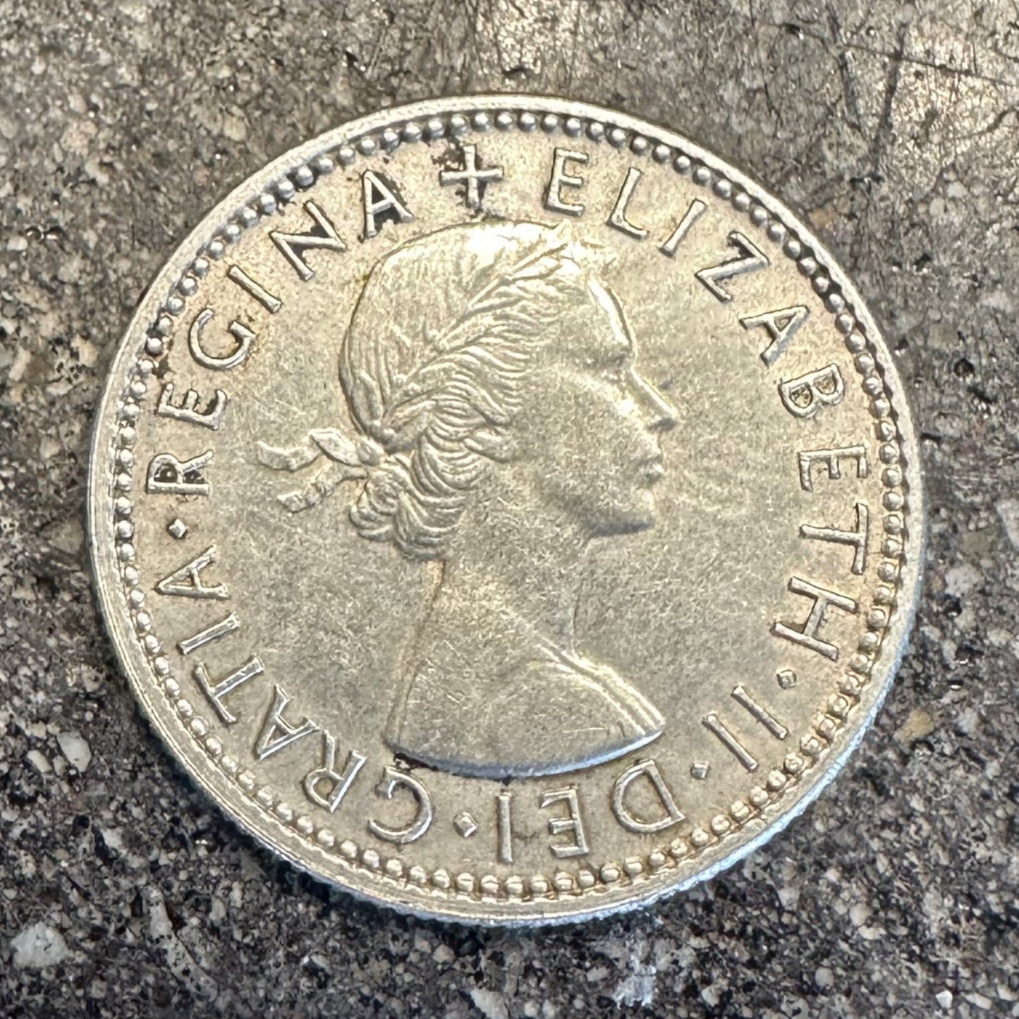 Australia Shilling Silver Coin front on dark concrete background. - Mountainstruck Coin Jewelry
