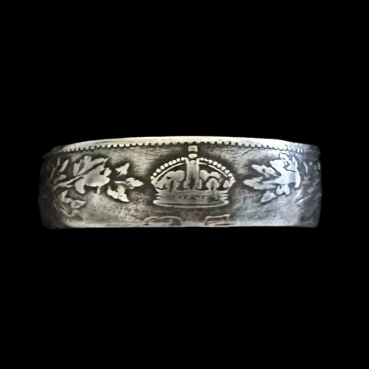 Canada 25 Cents Maple Leaf Silver Coin Ring in a brown kraft box on a black velvet background. - Mountainstruck Coin Jewelry