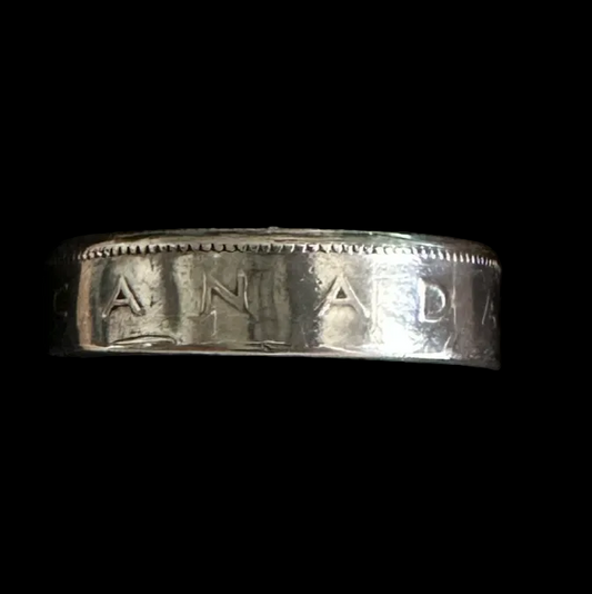 Canada 25 Cents Silver Coin Ring in a brown kraft box on a black velvet background. - Mountainstruck Coin Jewelry