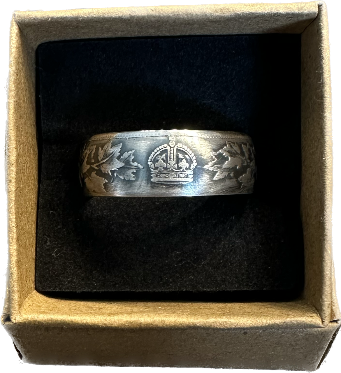 Canada 50 Cents Maple Leaf Silver Coin Ring in a brown kraft box on a black velvet background. - Mountainstruck Coin Jewelry
