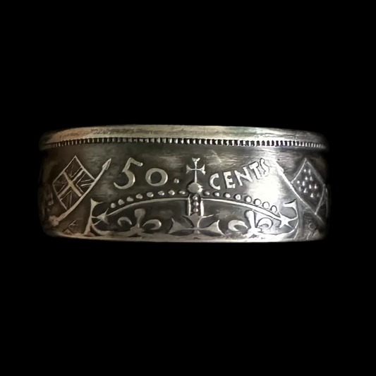 Canada 50 Cents Silver Coin Ring (Lion + Unicorn) in a brown kraft box on a black velvet background. - Mountainstruck Coin Jewelry