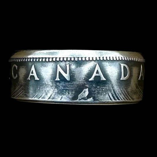 Canada Dollar Silver Coin Ring in a brown kraft box on a black velvet background. - Mountainstruck Coin Jewelry