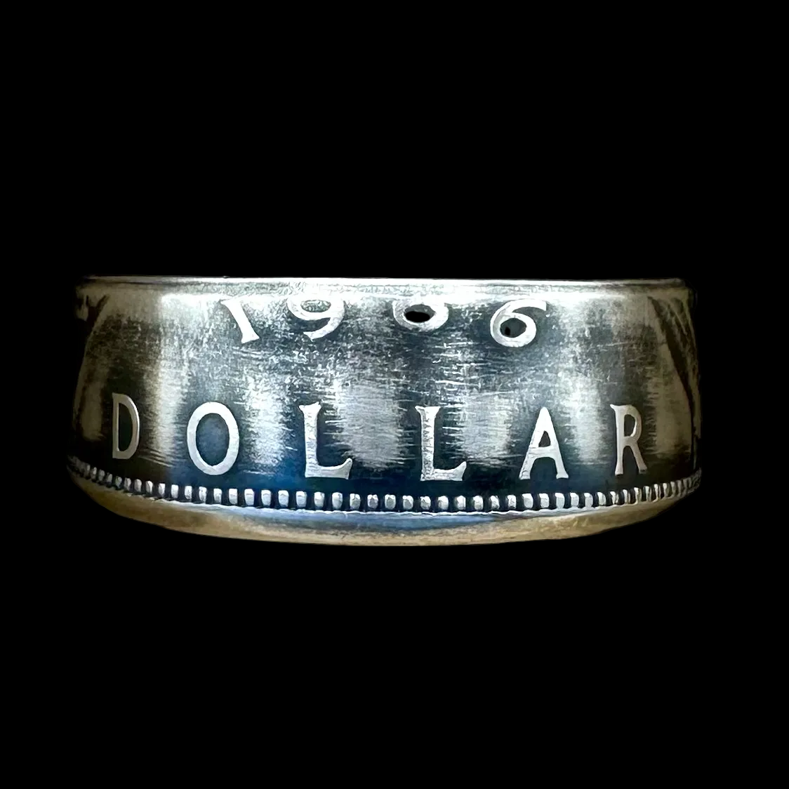 Canada Dollar Silver Coin Ring in a brown kraft box on a black velvet background. - Mountainstruck Coin Jewelry