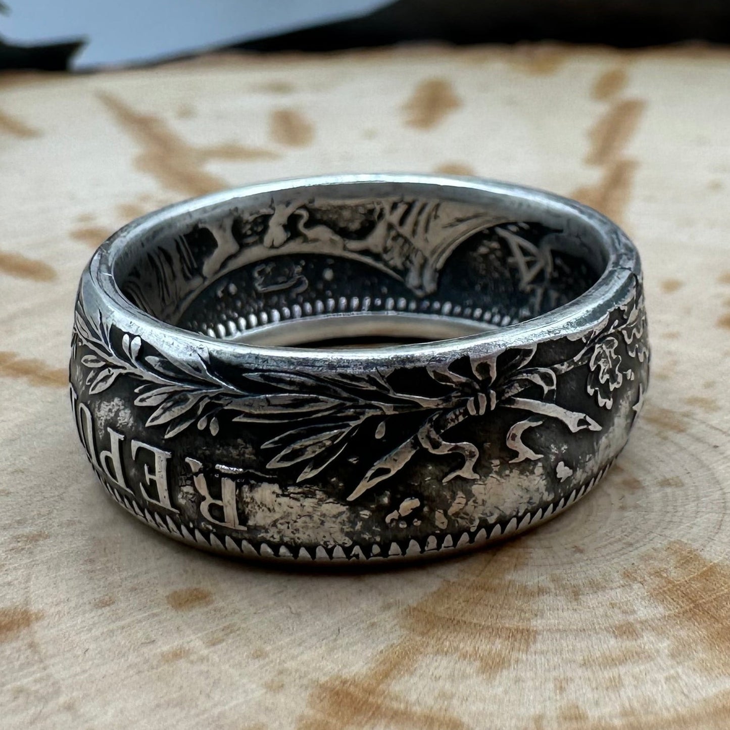 France Silver 10 Francs Coin Ring on a wood background. - Mountainstruck Coin Jewelry