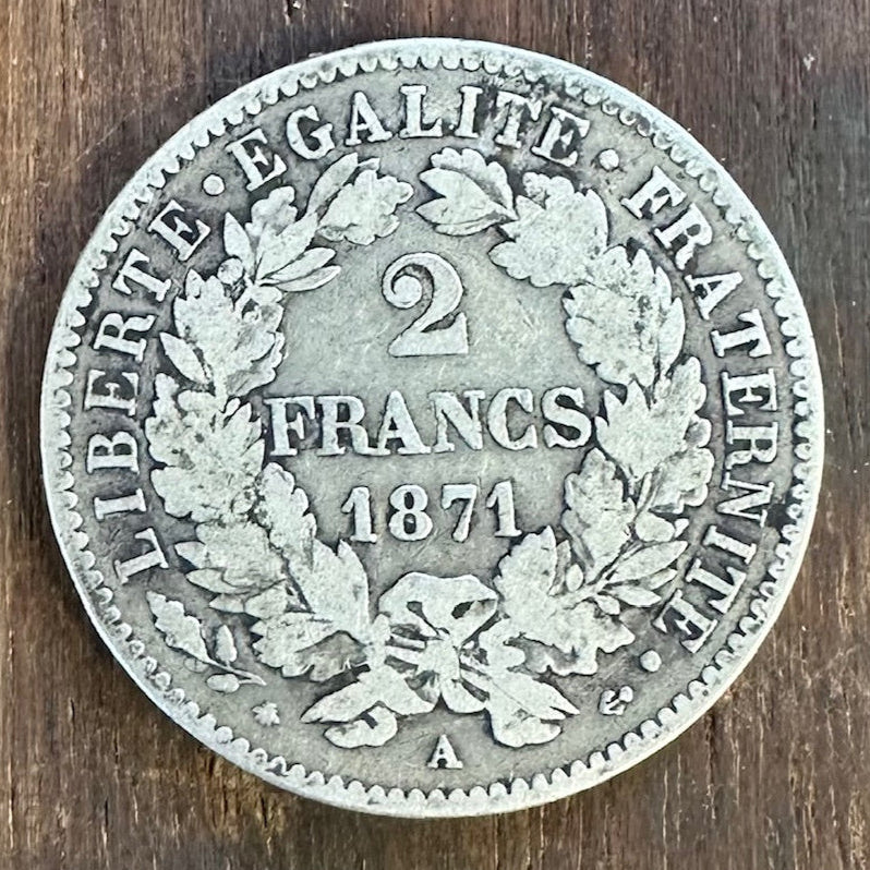 France 2 Franc Silver Coin back on a dark wood background. - Mountainstruck Coin Jewelry