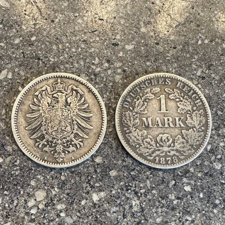 Germany 1 Mark Silver Coin on a concrete background. Front of coin on left side and back of the coin on the right side of the picture. - Mountainstruck Coin Jewelry