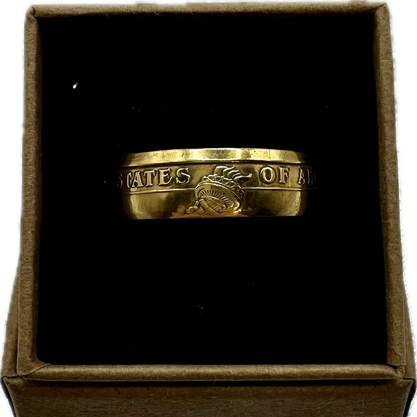 Gold Plated U.S. Presidential Dollar Coin Ring in a brown kraft box on a black velvet background. - Mountainstruck Coin Jewelry