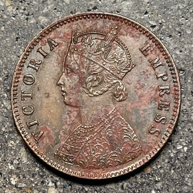 India Quarter Anna Coin front on a concrete background. - Mountainstruck Coin Jewelry