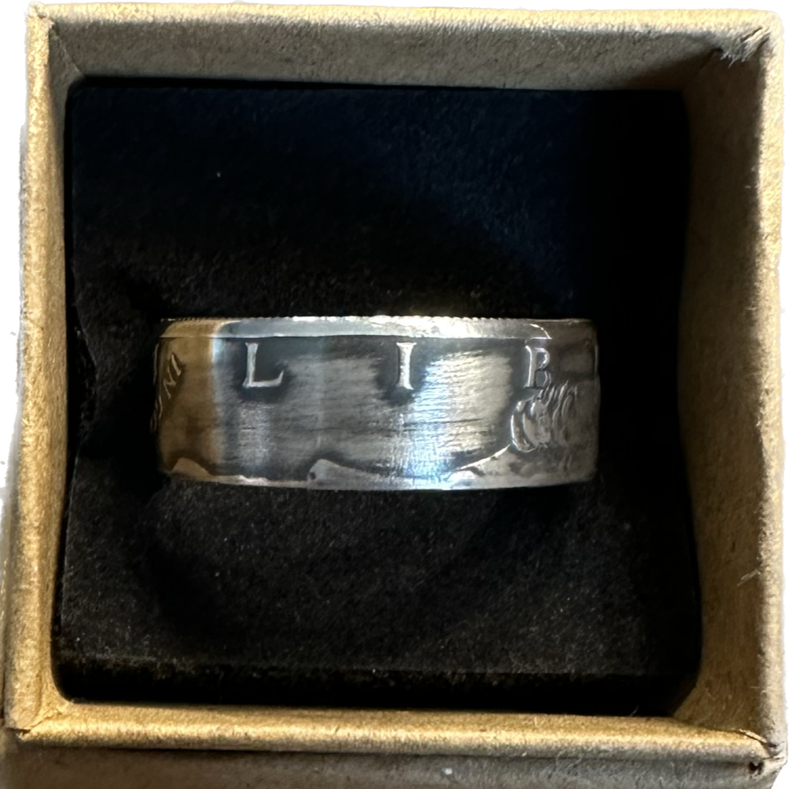 JFK 1964 Half Dollar Silver Coin Ring in a brown kraft box on black velvet background. - Mountainstruck Coin Jewelry