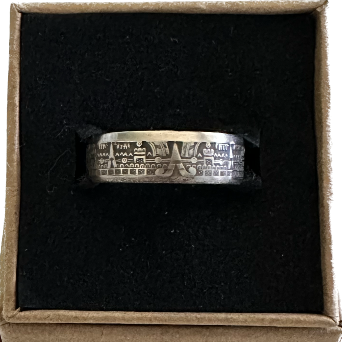 Mexico 10 Centavos Coin Ring in a brown kraft box on a black velvet background. - Mountainstruck Coin Jewelry