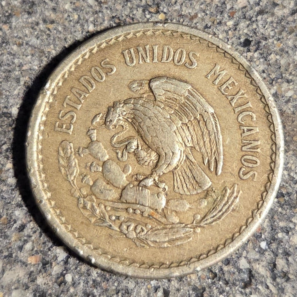 Mexico 10 Centavos Coin front on a concrete background. - Mountainstruck Coin Jewelry