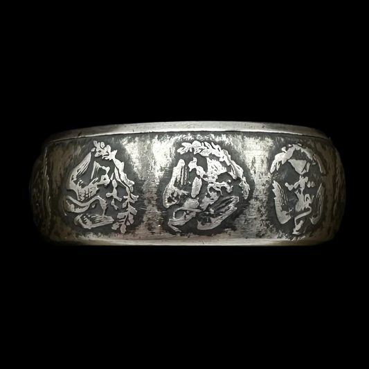 Mexico 1oz Libertad .999 Silver Coin Ring in a brown kraft box on a black velvet background. - Mountainstruck Coin Jewelry