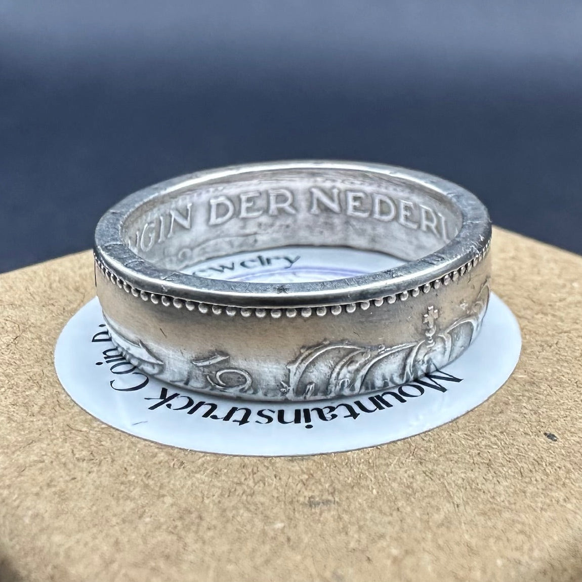 Netherlands 1 Gulden Silver Coin Ring on brown kraft box. - Mountainstruck Coin Jewelry