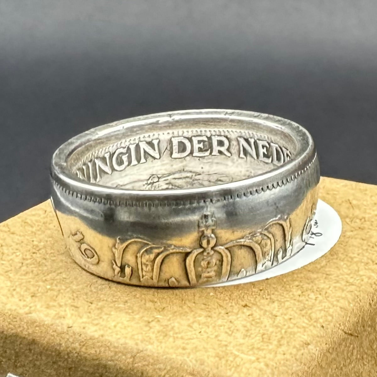 Netherlands 2.5 Gulden Silver Coin Ring on a brown kraft box. - Mountainstruck Coin Jewelry