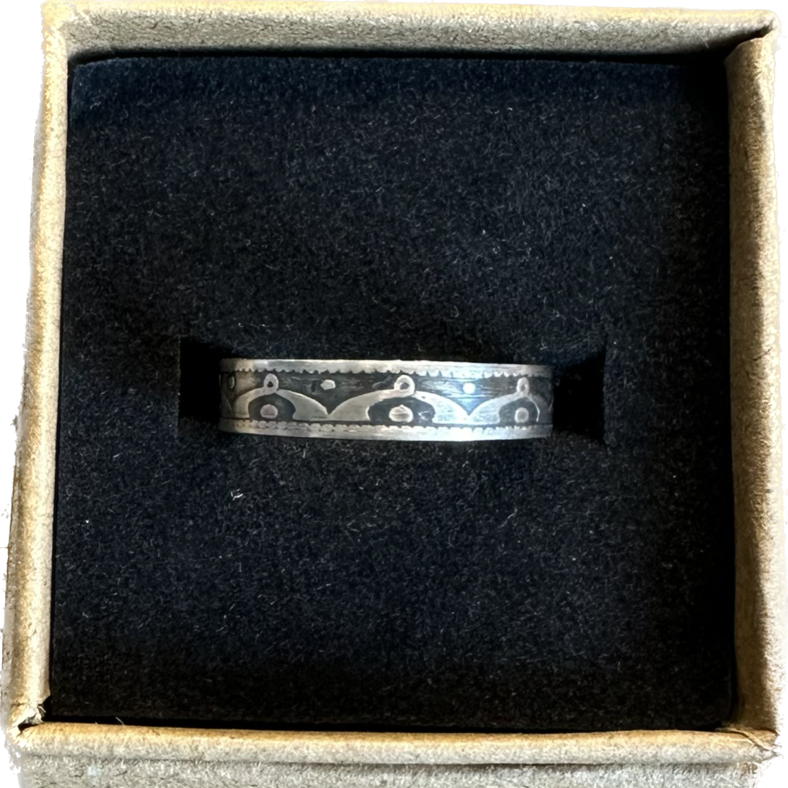 Newfoundland 10 Cents Silver Coin Ring in a brown kraft box on a black velvet background. - Mountainstruck Coin Jewelry