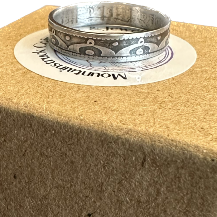 Newfoundland 10 Cents Silver Coin Ring on a brown kraft box. - Mountainstruck Coin Jewelry