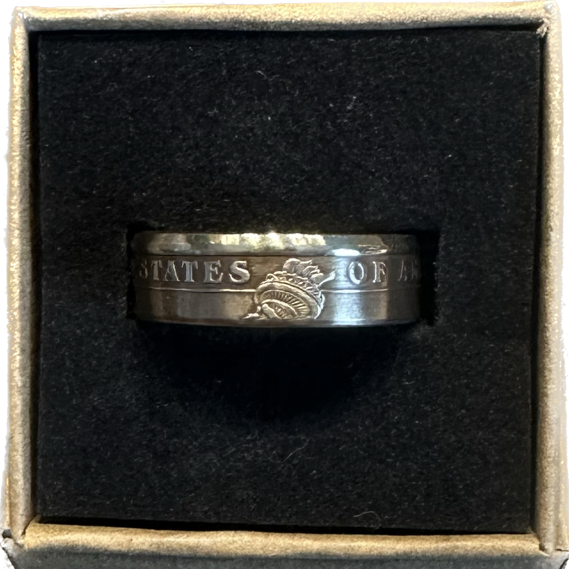 Presidential Gold Dollar Coin Ring in a brown craft box on a black velvet background. - Mountainstruck Coin Jewelry