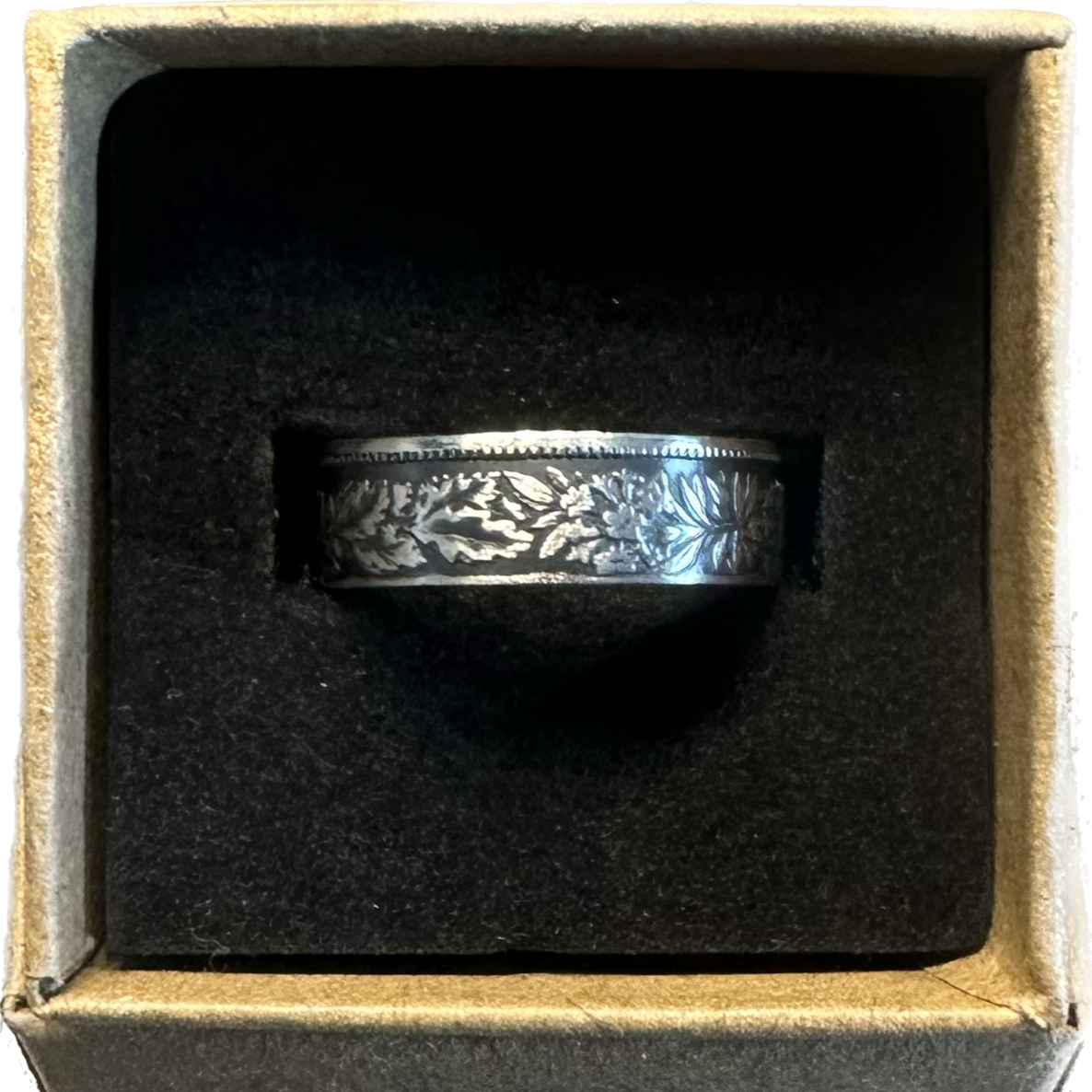 Swiss 1 Franc Silver Coin Ring in a brown craft box on a black velvet background. - Mountainstruck Coin Jewelry