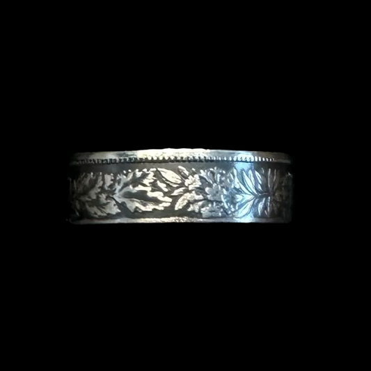 Swiss 1 Franc Silver Coin Ring in a brown craft box on a black velvet background. - Mountainstruck Coin Jewelry