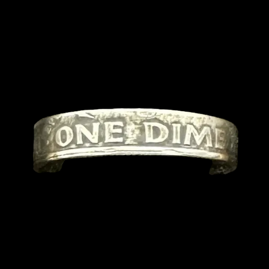 U.S. Dime Coin Ring in a brown kraft box on a black velvet background. - Mountainstruck Coin Jewelry