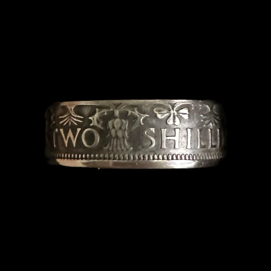 UK Two Shillings Coin Ring in a brown kraft box on a black velvet background. - Mountainstruck Coin Jewelry