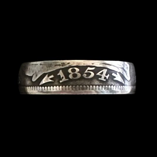 U.S. Seated Liberty Quarter Silver Coin Ring in a black velvet background in a brown kraft box.
- Mountainstruck Coin Jewelry