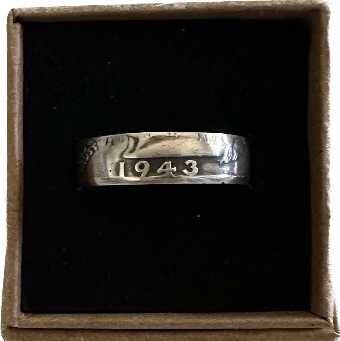 Washington Silver Quarter Coin Ring (front) in a brown kraft box on a black velvet background. - Mountainstruck Coin Jewelry