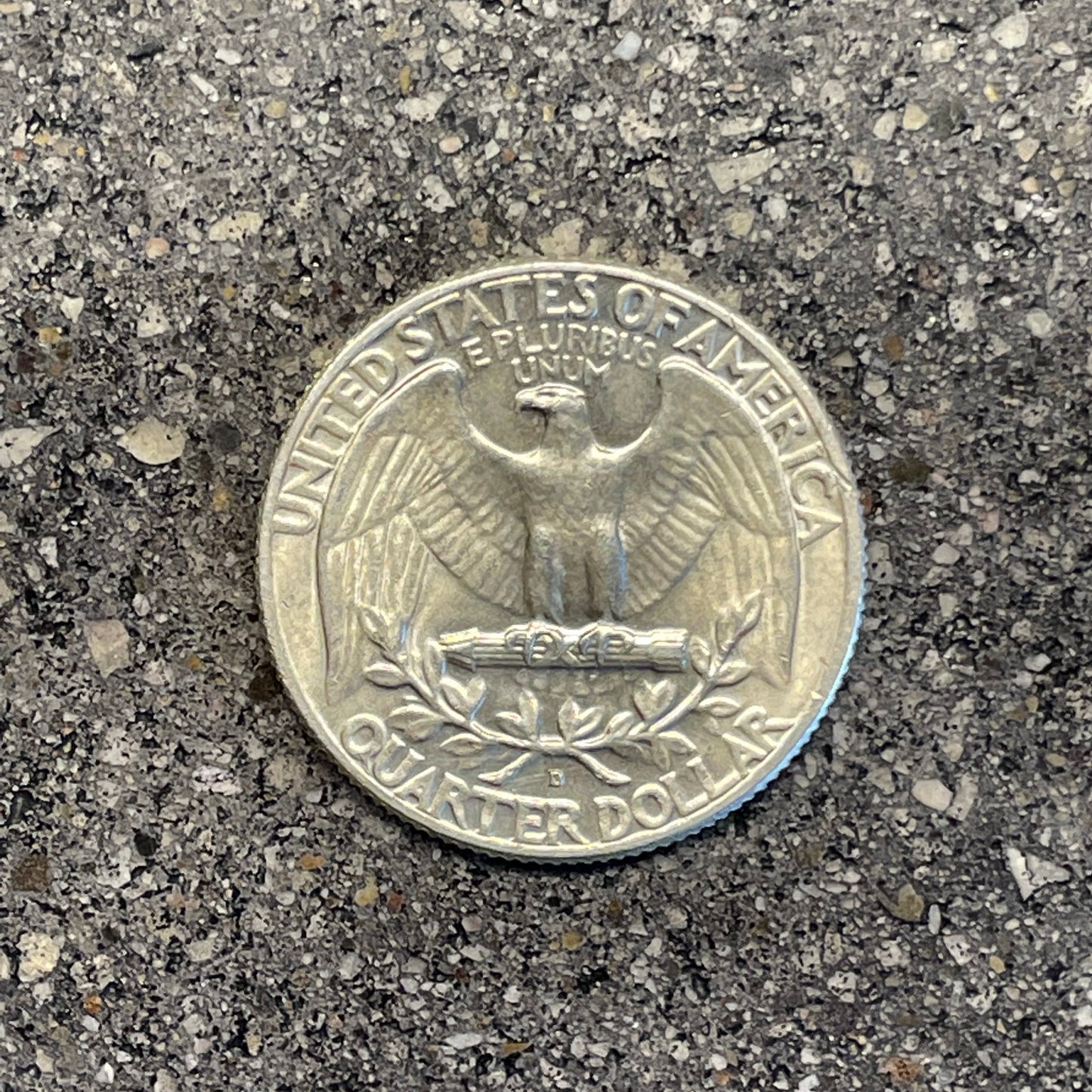 Washington Silver Quarter Coin back on a concrete background. - Mountainstruck Coin Jewelry