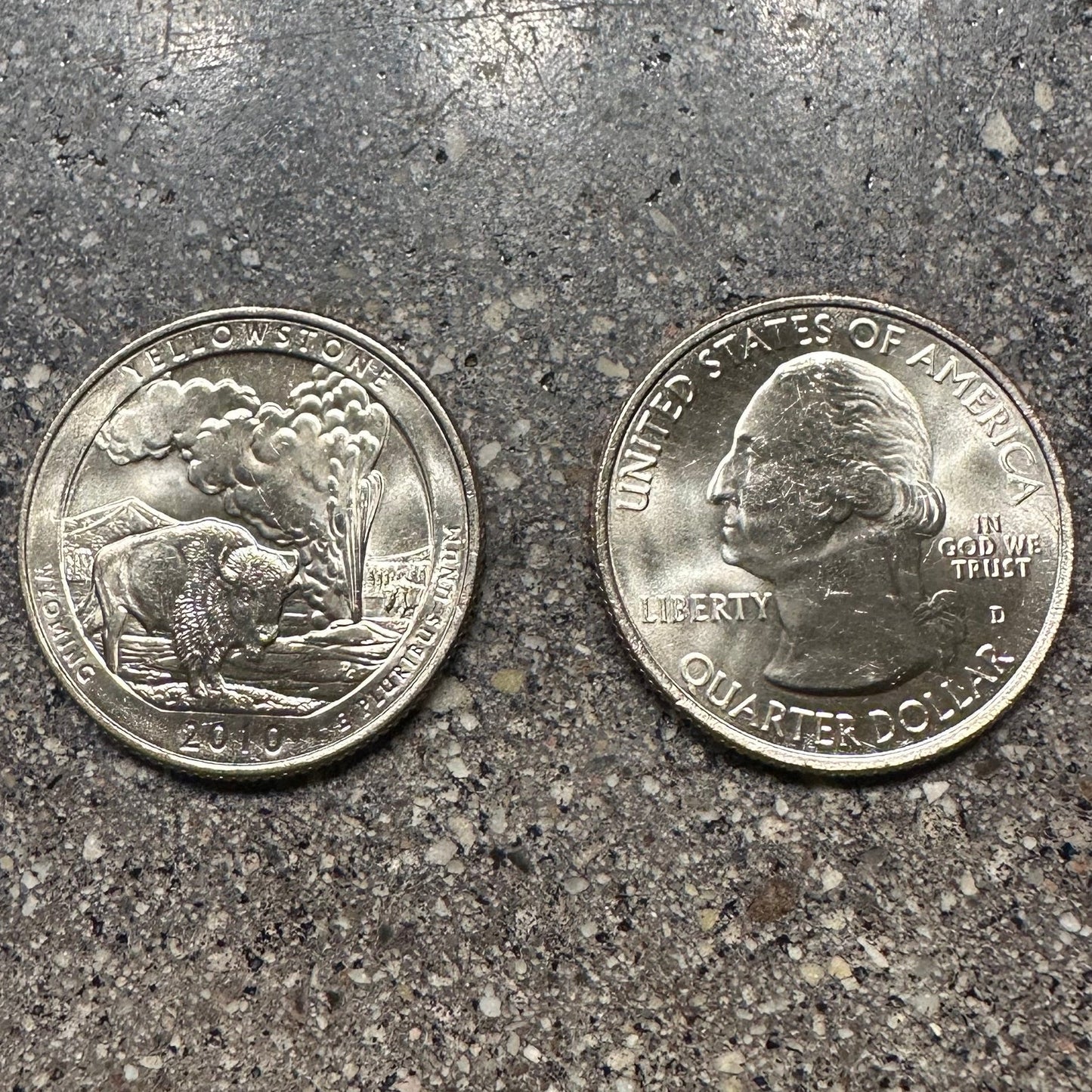 U.S. Yellowstone National Park Quarter Coin back on left side and front on right side of image on a concrete background. - Mountainstruck Coin Jewelry