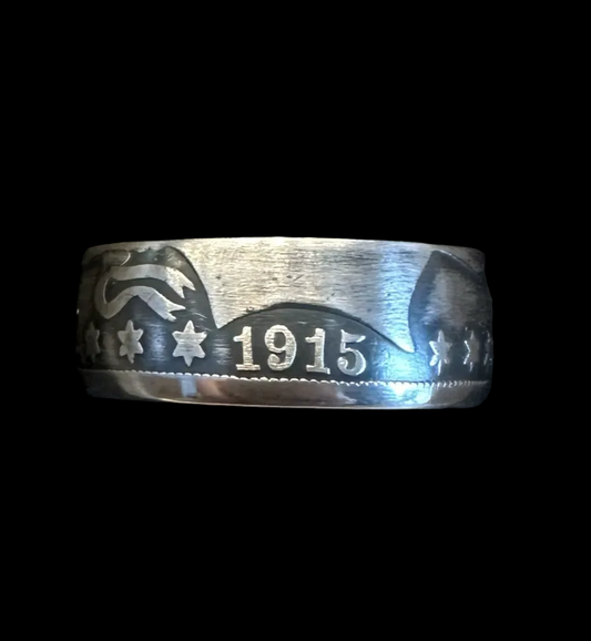 U.S. Barber Silver Half Dollar Coin Ring (front) in a brown kraft box on a black velvet background. - Mountainstruck Coin Jewelry